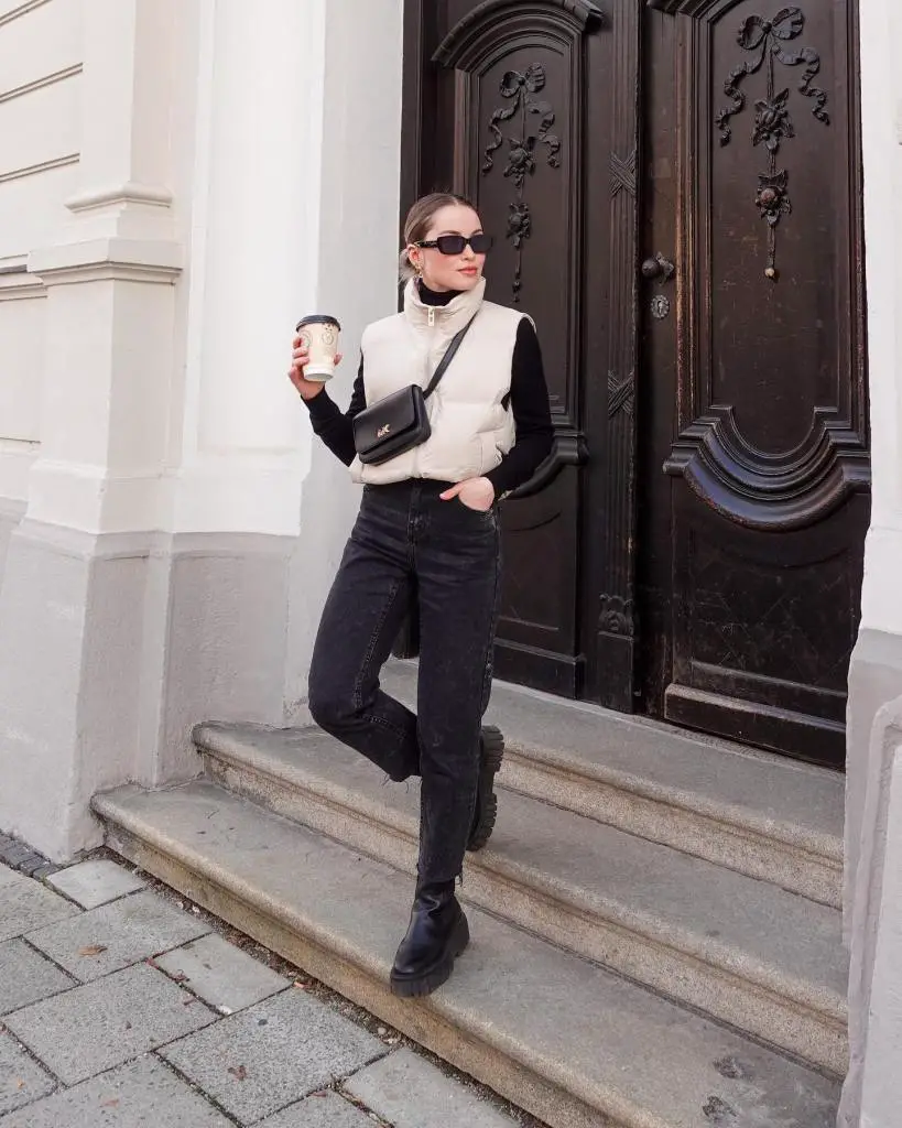 Cream Puffer Vest with Turtleneck and Black Jeans Cream Puffer Vest with Turtleneck and Black Jeans — Puffer Vest Outfits