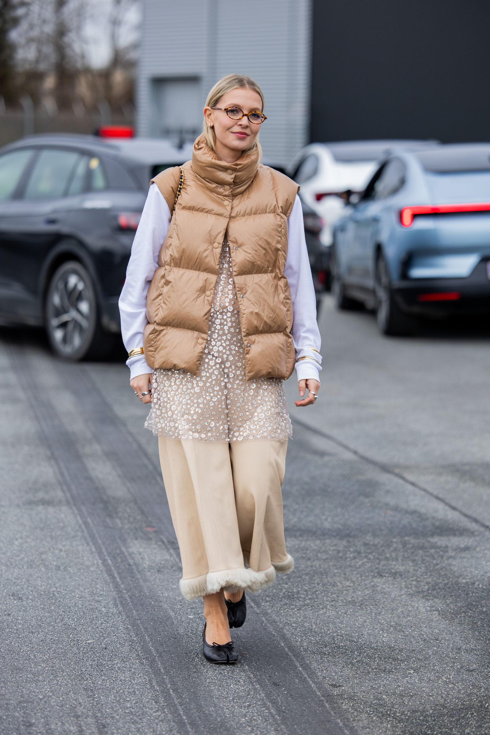 Puffer Vest Over Sheer Dress and Wide-Leg Trousers Puffer Vest Over Sheer Dress and Wide-Leg Trousers — Puffer Vest Outfits