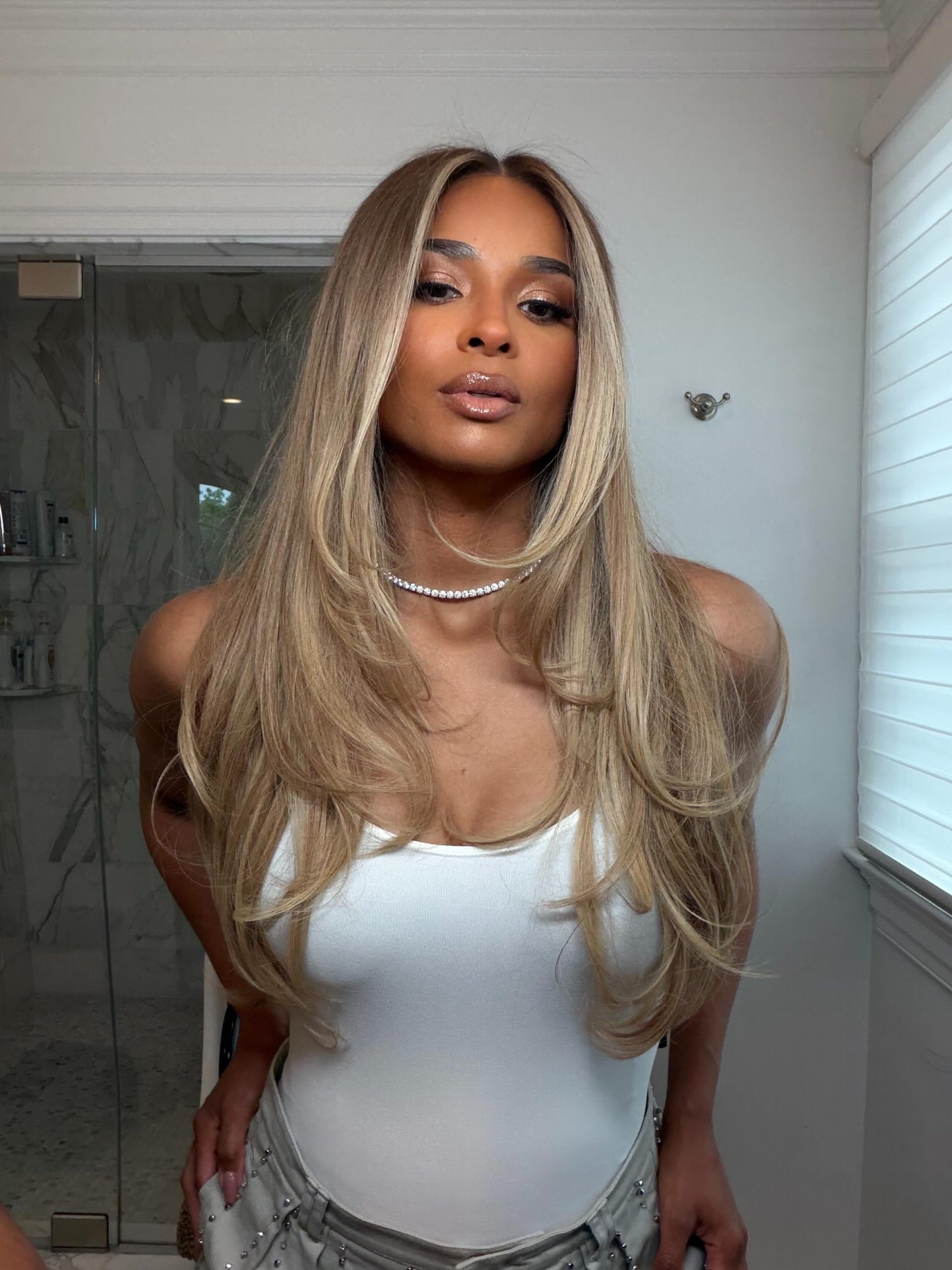 Ash Blonde With Darker Roots and Highlights Ash Blonde With Darker Roots and Highlights — Winter Hair Colors for Plus Size Women