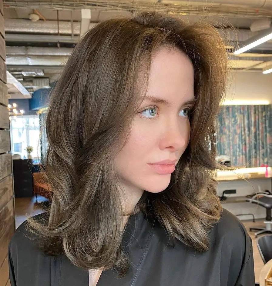 Ash Brown With Subtle Highlights Ash Brown With Subtle Highlights — Winter Hair Colors for Blue Eyes