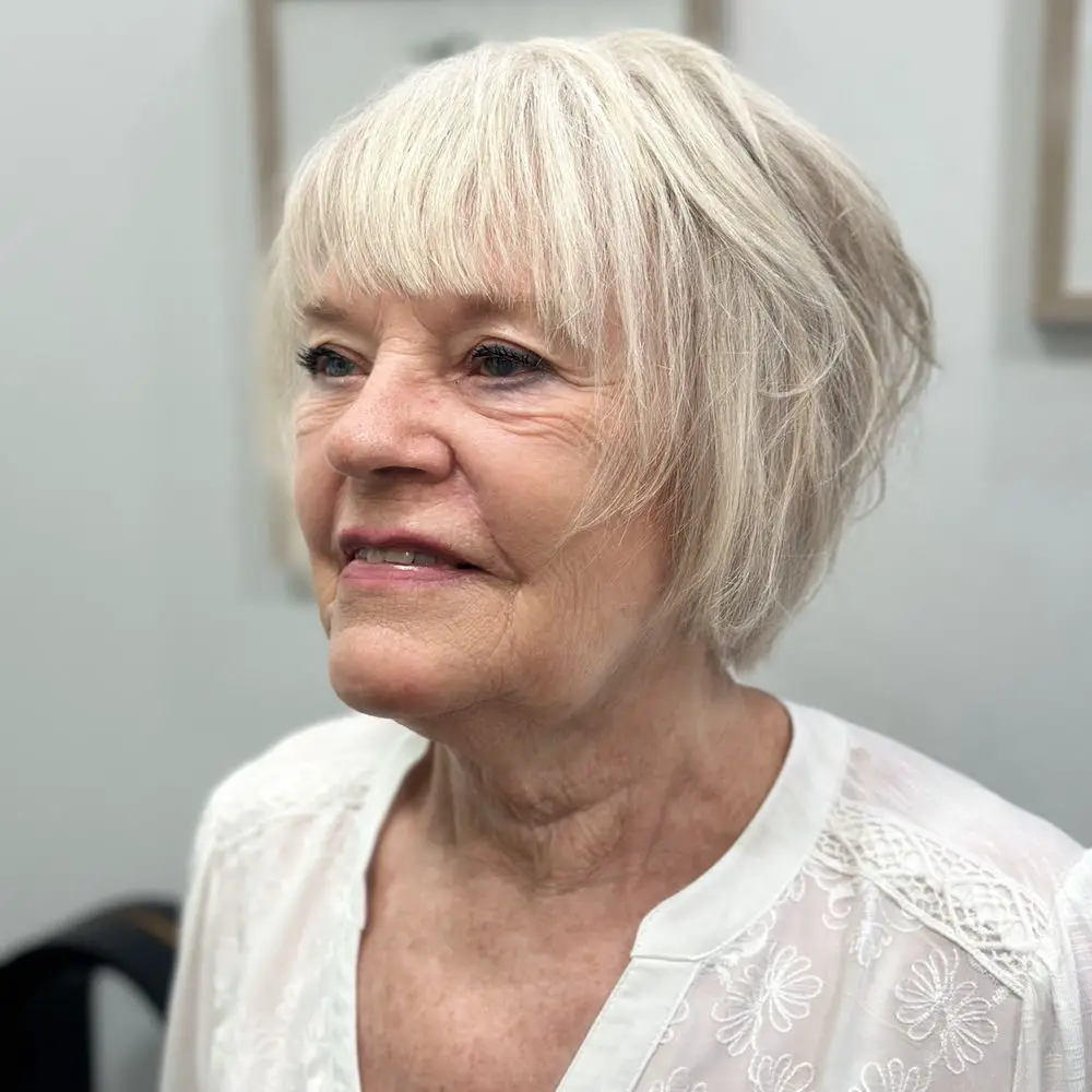 Chin Elegant Ash Blonde Bob with Silver Chin Elegant Ash Blonde Bob with Silver — Winter Hair Colors for Women Over 70