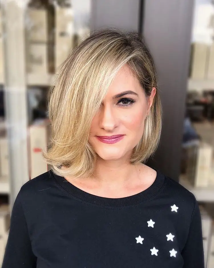 Blonde Bob with Side Bangs Blonde Bob with Side Bangs — Winter Haircuts for Women Over 50