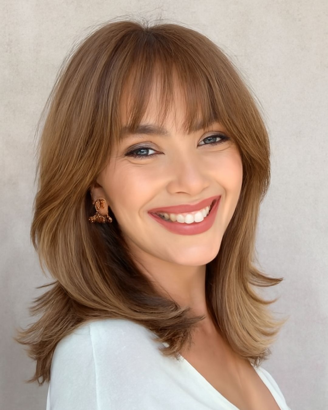 Front View Collarbone Layers With Full Bangs Front View Collarbone Layers With Full Bangs — Winter Haircuts for Heart Shaped Faces