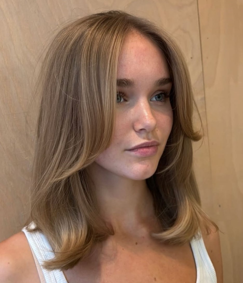Ash Blonde With Subtle Highlights Collarbone Layers With Ash Blonde Ash Blonde With Subtle Highlights Collarbone Layers With Ash Blonde — Winter Haircuts for Heart Shaped Faces
