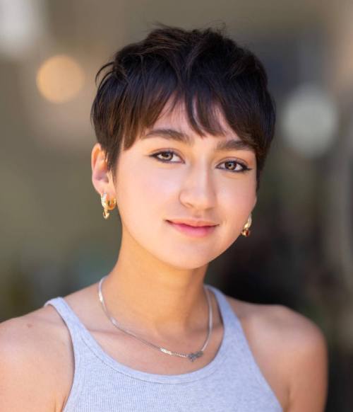 Textured Pixie with Wispy Bangs Textured Pixie with Wispy Bangs — Winter Hairstyles for Round Faces