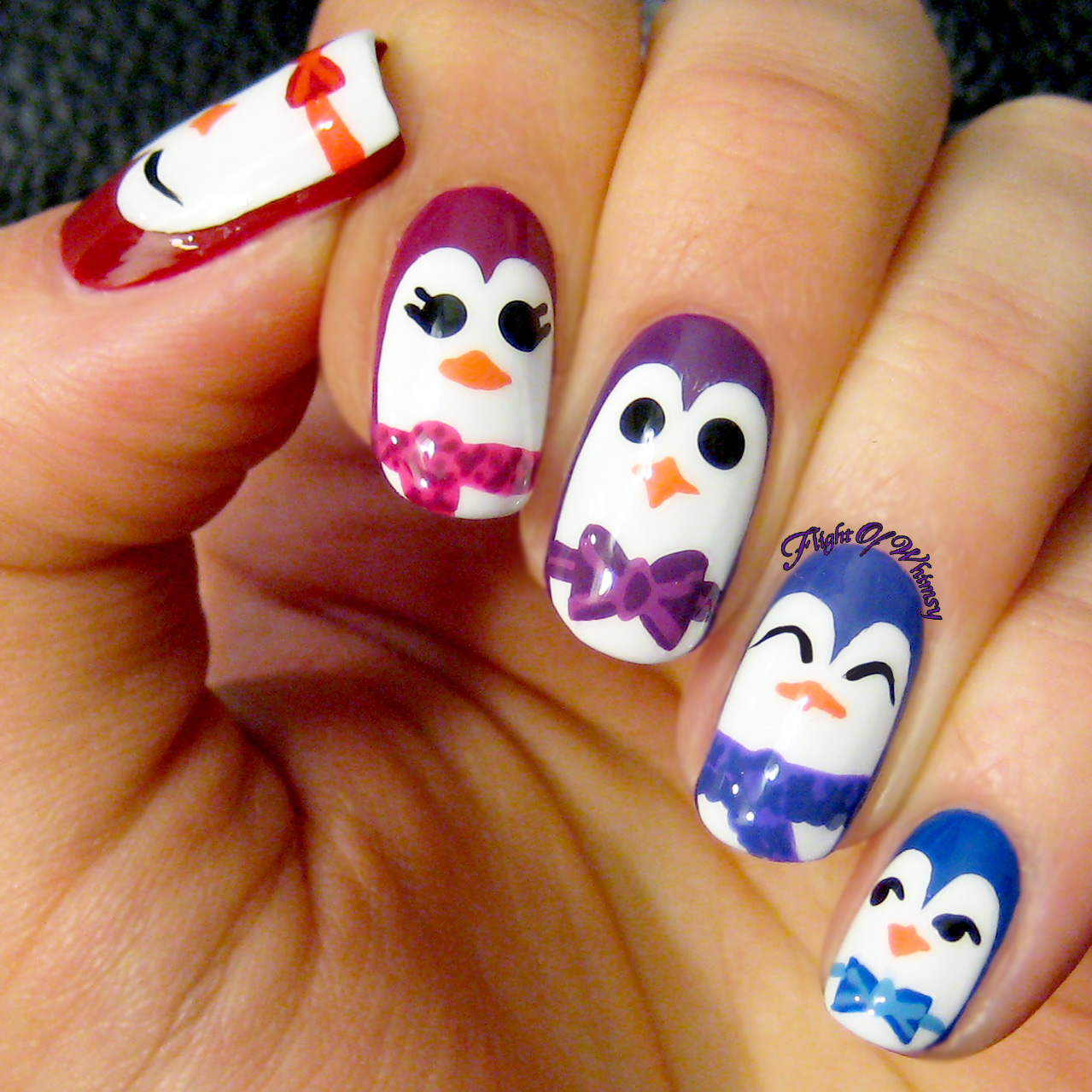 Playful Penguin Art on Medium Oval Nails Playful Penguin Art on Medium Oval Nails — Winter Nails for Kids