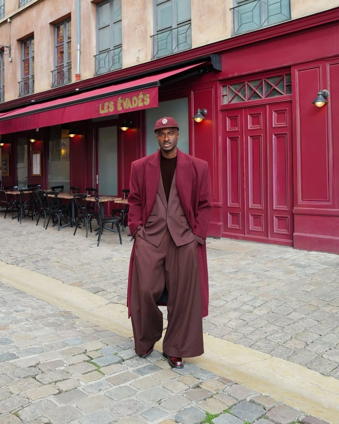 Wine long coat with matching wide trousers cap and sneakers