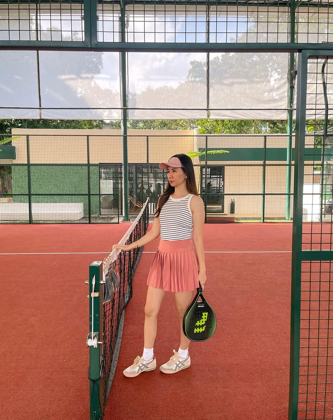 Striped fitted tank coral pleated skirt visor white shoes and padel gear