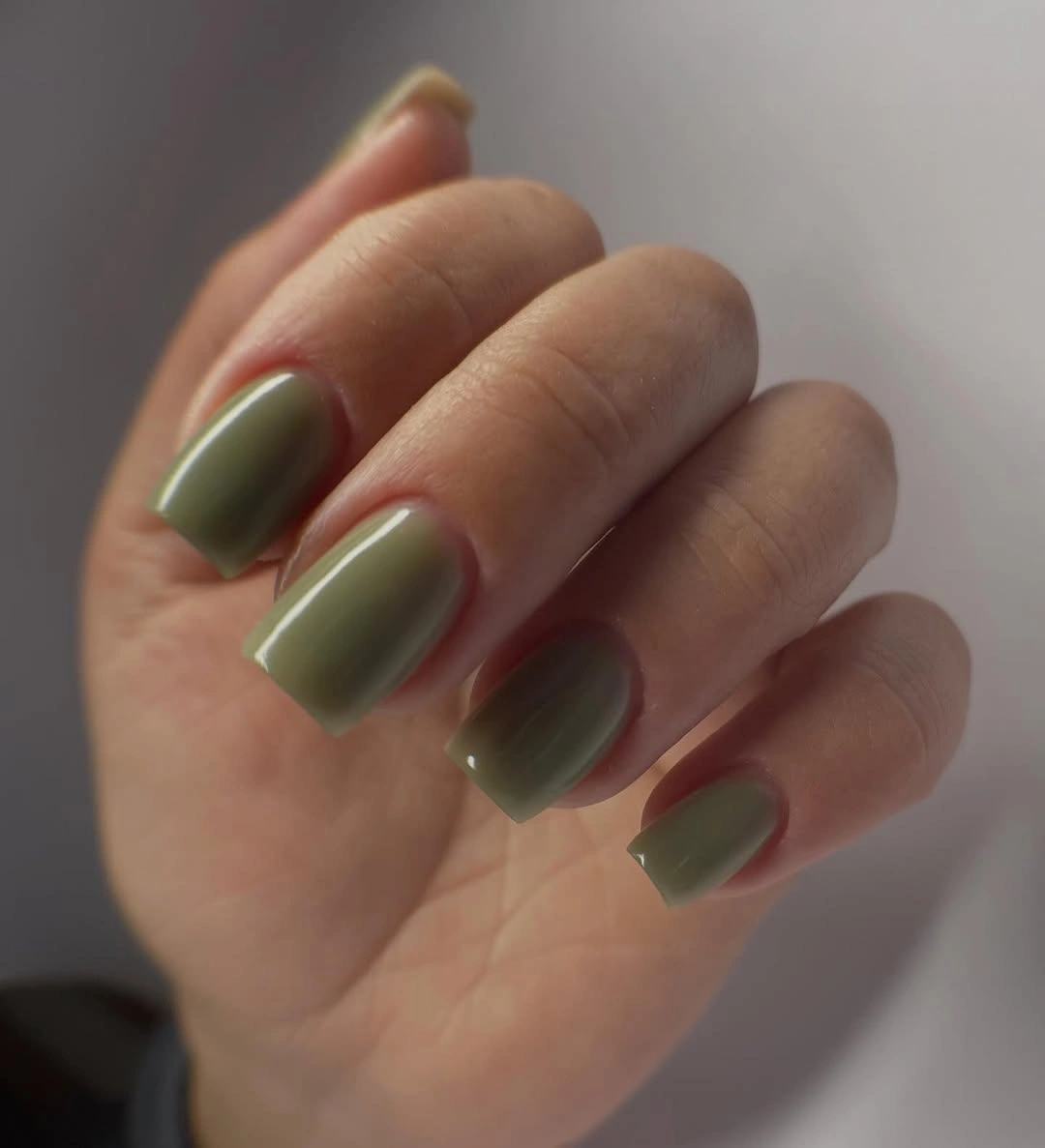 Glossy olive green short-to-medium soft square nails