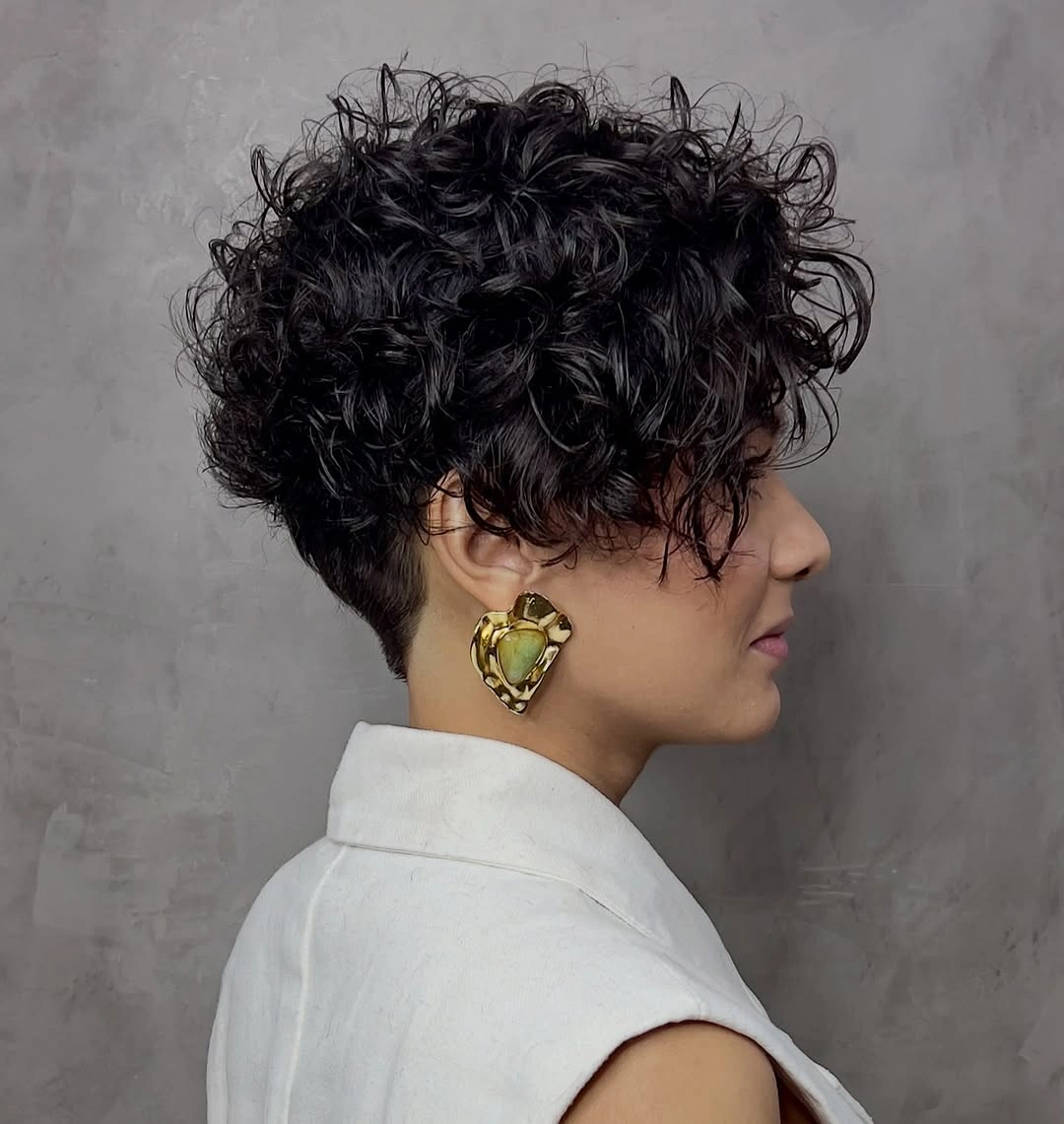 Short brown wavy shape with center part and highlighted strands