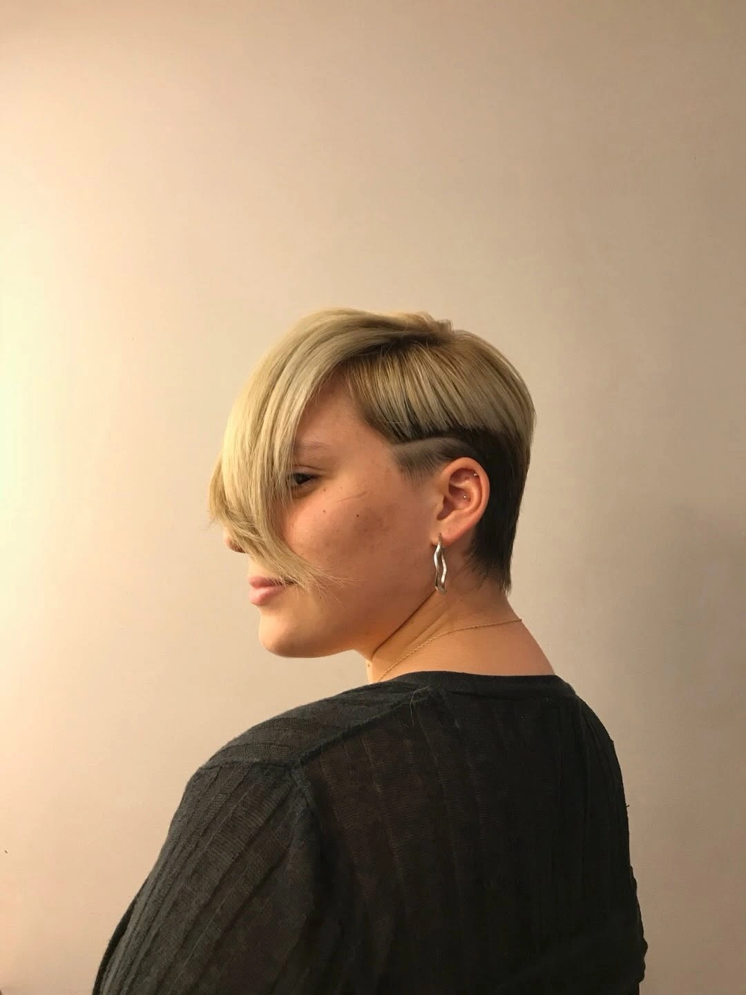 Warm brown hair with broken fringe and wispy lower lengths
