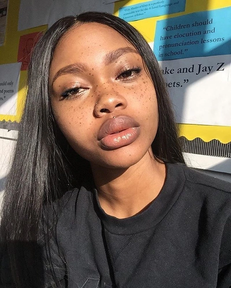 Long sleek straight dark hair shown in sunlight