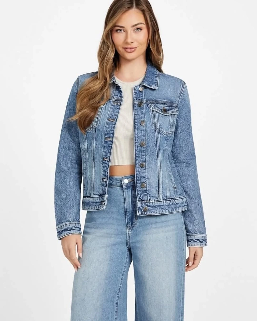 Light denim jacket with white top and wide jeans