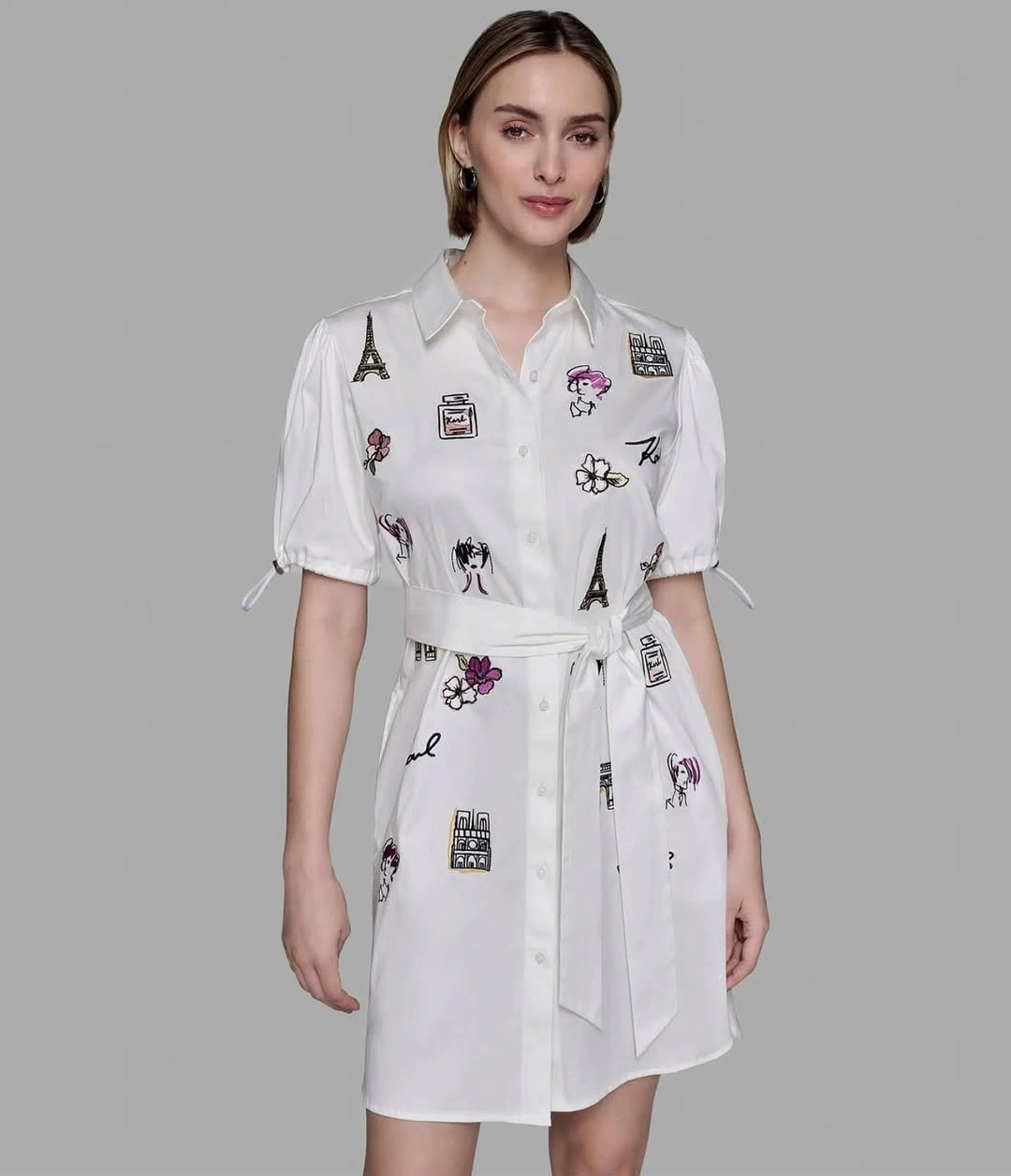 White button-front shirtdress with scattered illustrated motifs