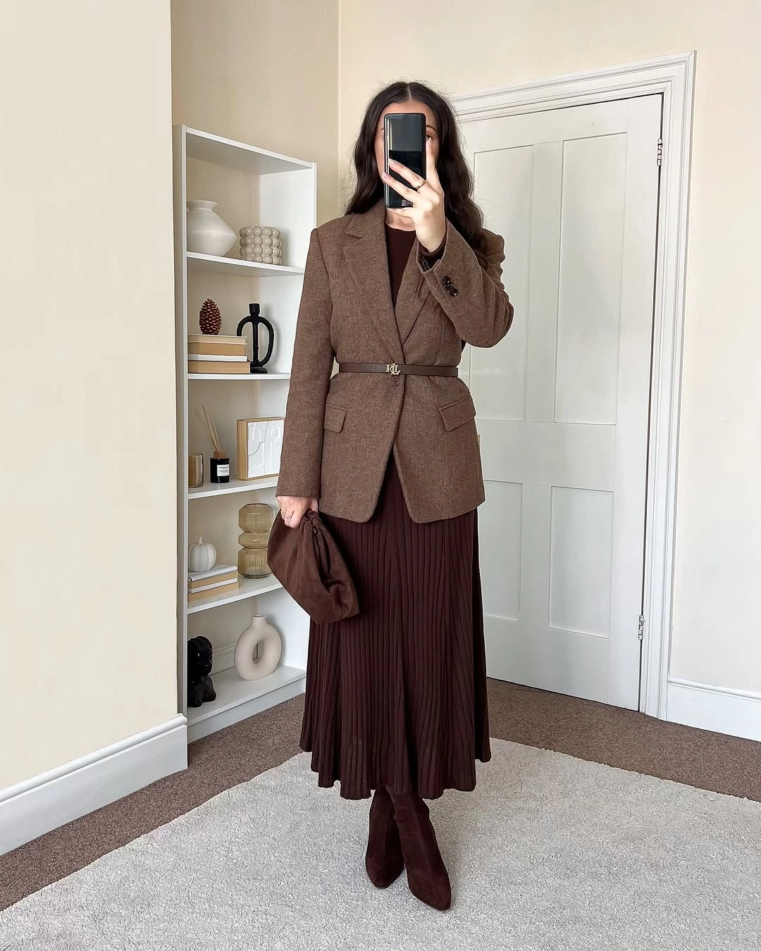Belted brown blazer with pleated midi skirt and boots
