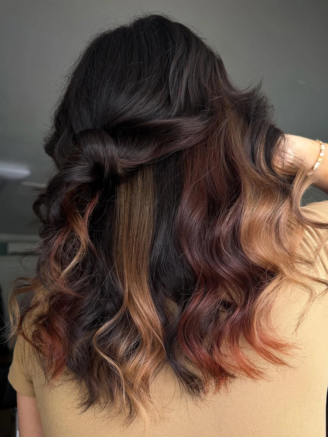 Long soft brown hair with beige highlights and face framing