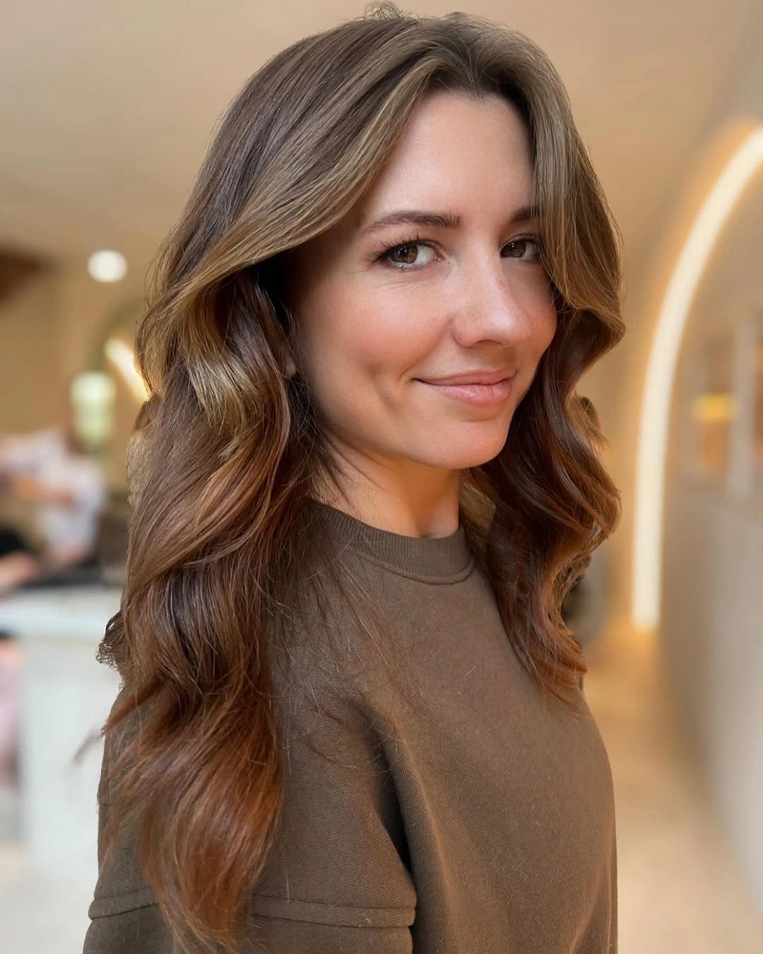 Short dark espresso bob with rounded ends and soft shine