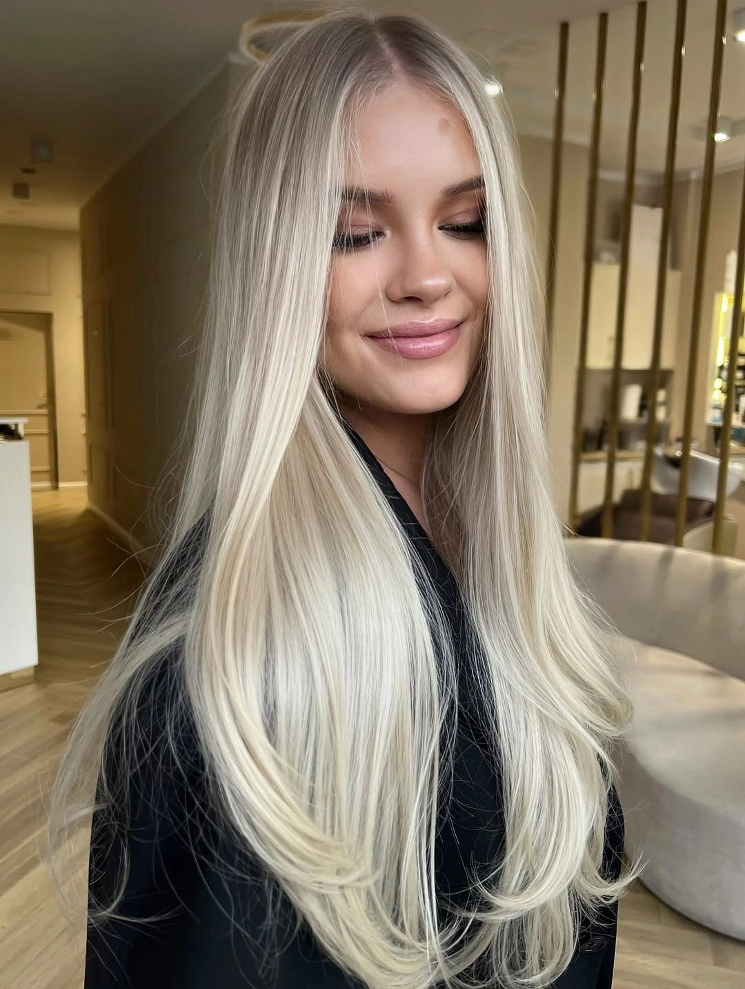 Very long icy blonde hair with near-white front sections