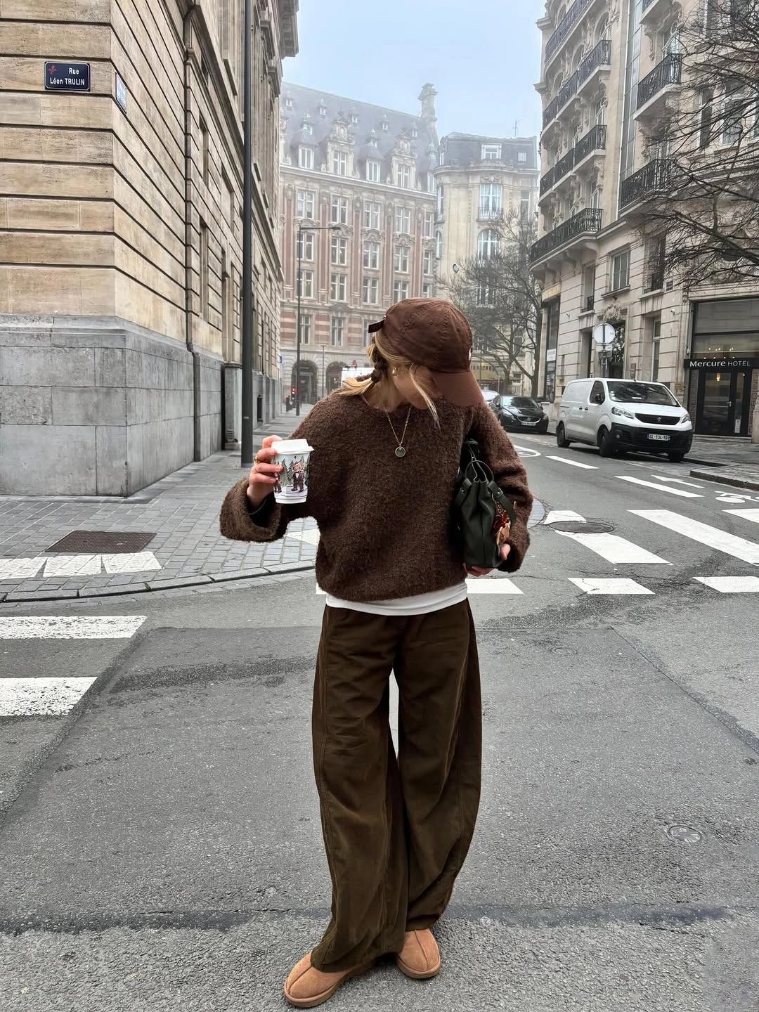 Brown fuzzy sweater with wide trousers cap and tan shoes