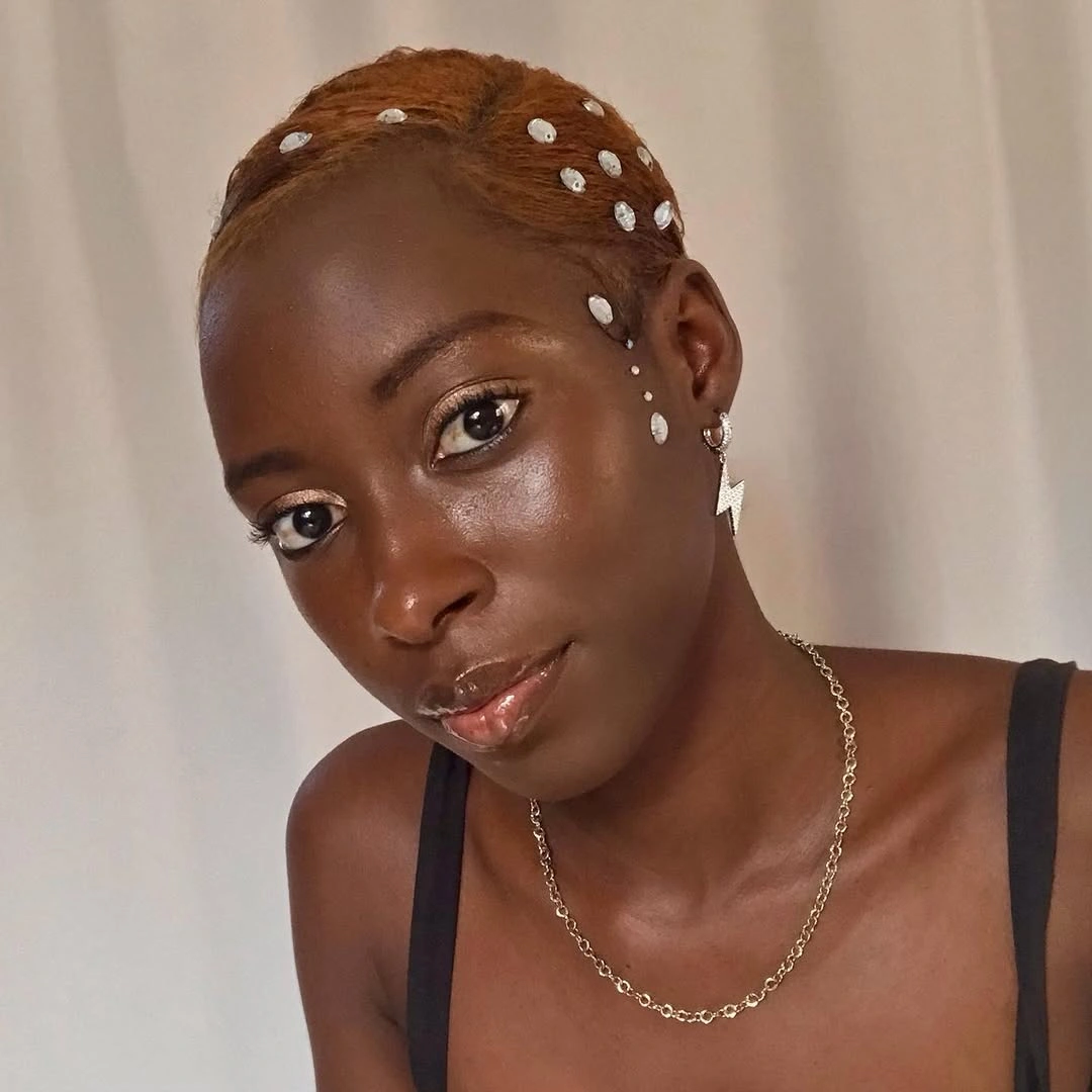 Vivid red cornrows with curved rows and long wavy length