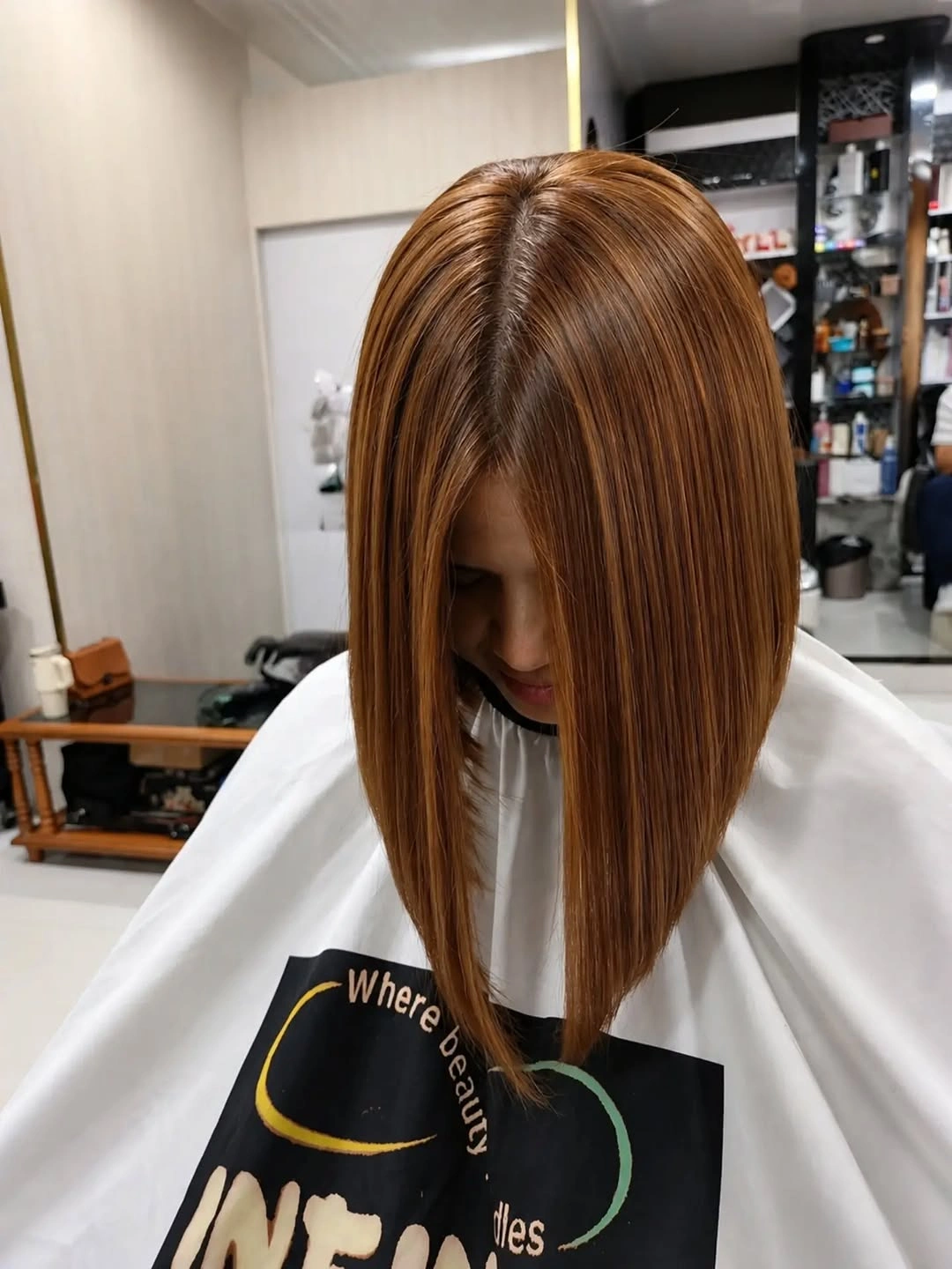 Straight angled lob with shorter back and long front sections