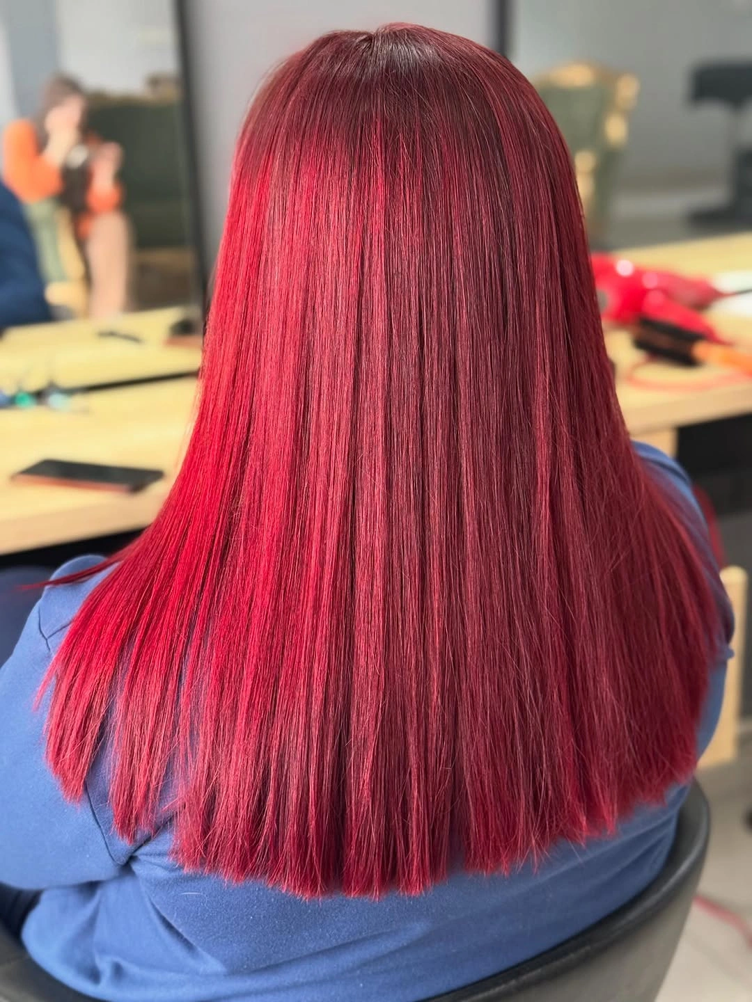 Long straight red hair with dense softly rounded bottom edge