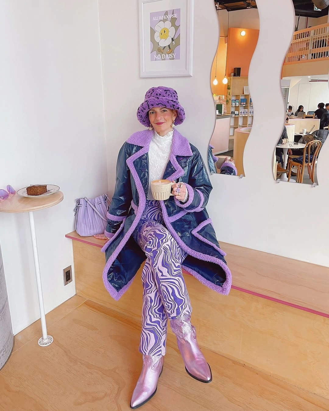 Purple patterned coat and trousers with lilac bucket hat