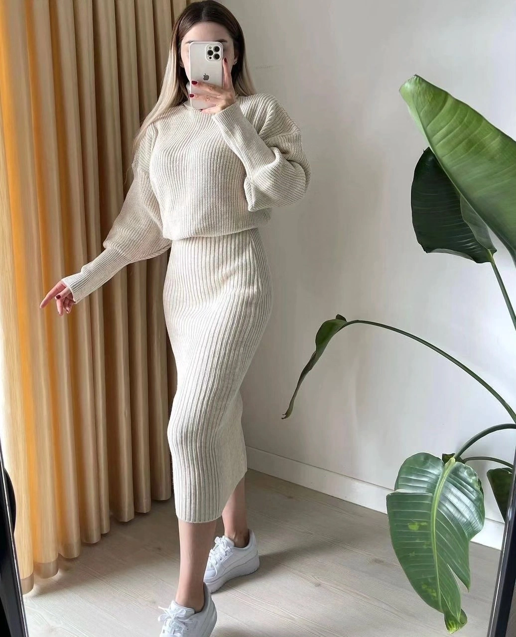 Cream ribbed sweater and midi skirt with white sneakers
