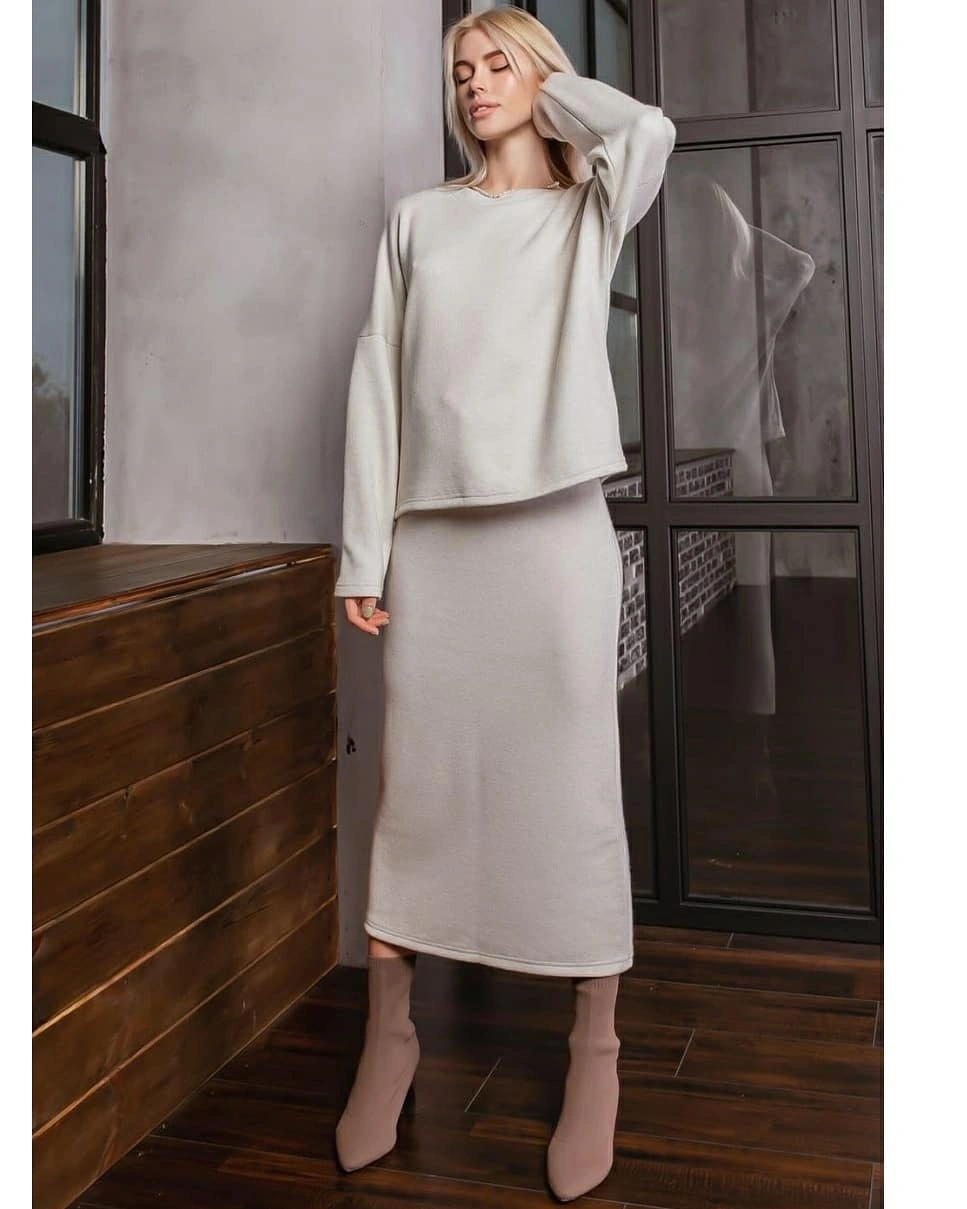 Cream long skirt set with beige ankle boots
