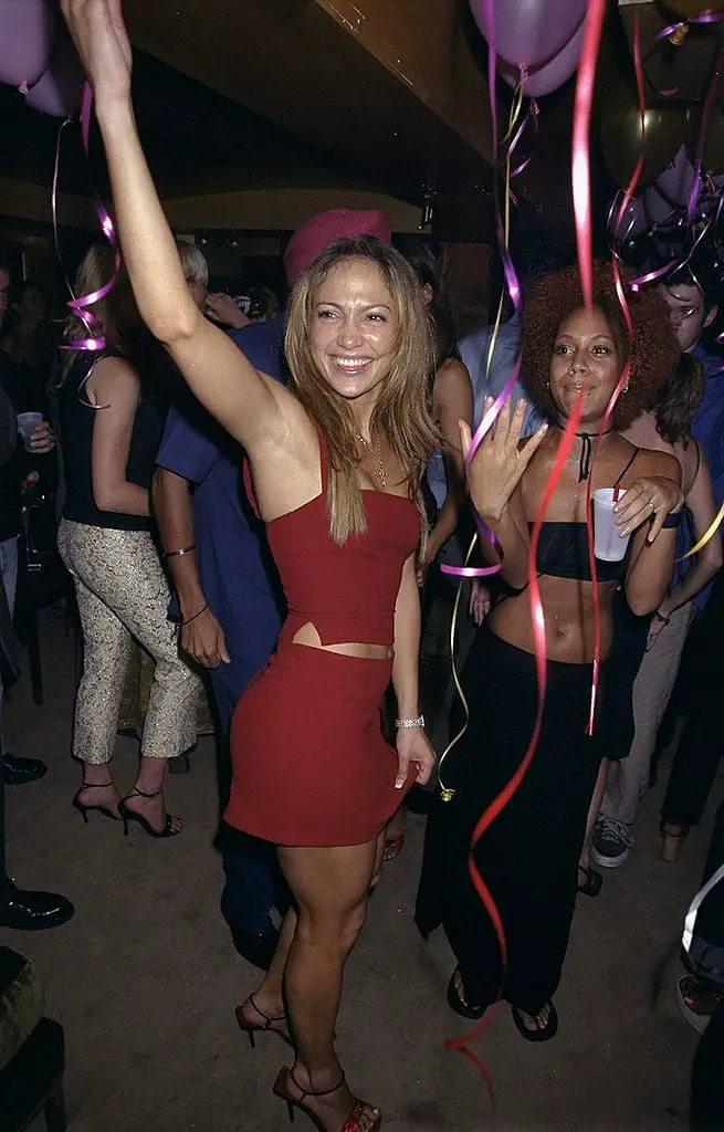 Red Cropped Top and Mini Skirt Set for a 90s Party Red Cropped Top and Mini Skirt Set for a 90s Party — 90s Party Outfit Inspiration