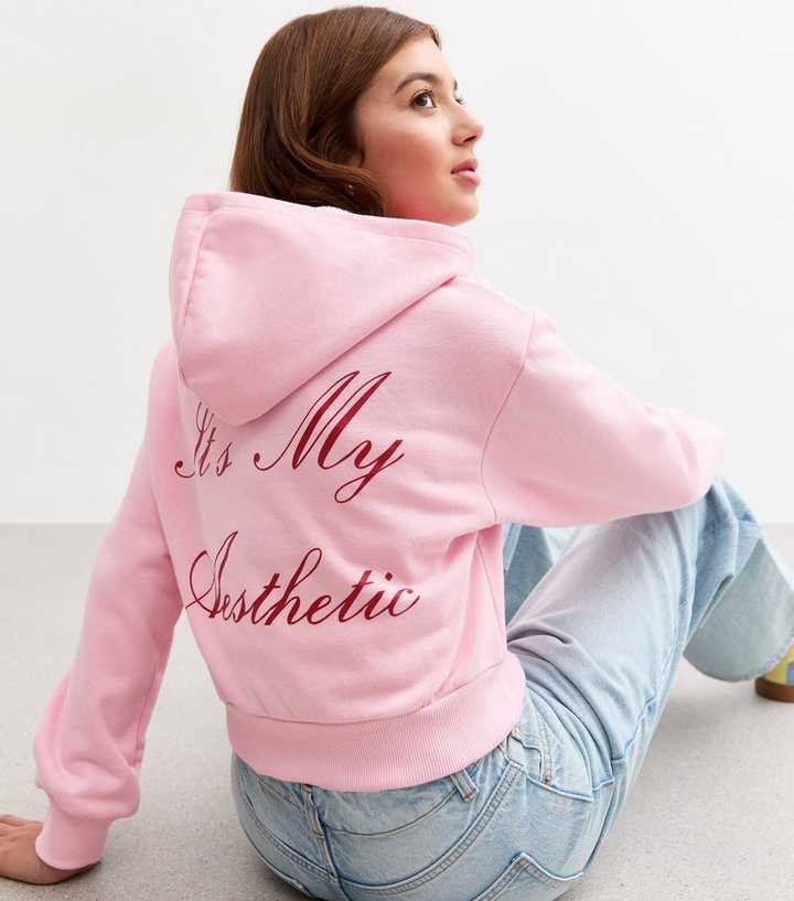 Pink Cropped Zip-Up Hoodie With Relaxed Fit Jeans Pink Cropped Zip-Up Hoodie With Relaxed Fit Jeans — Aesthetic Hoodie Outfits Women