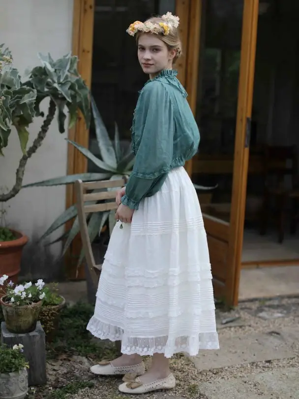 White Tiered Linen Skirt with a Ruffled Green Blouse, Close-Up Take White Tiered Linen Skirt with a Ruffled Green Blouse, Close-Up Take — Aesthetic Long Skirt Outfits