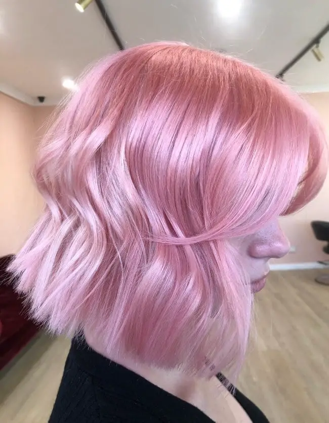 Textured Chin Length Bob With Side Swept Bangs Textured Chin Length Bob With Side Swept Bangs — Aesthetic Pastel Pink Hair