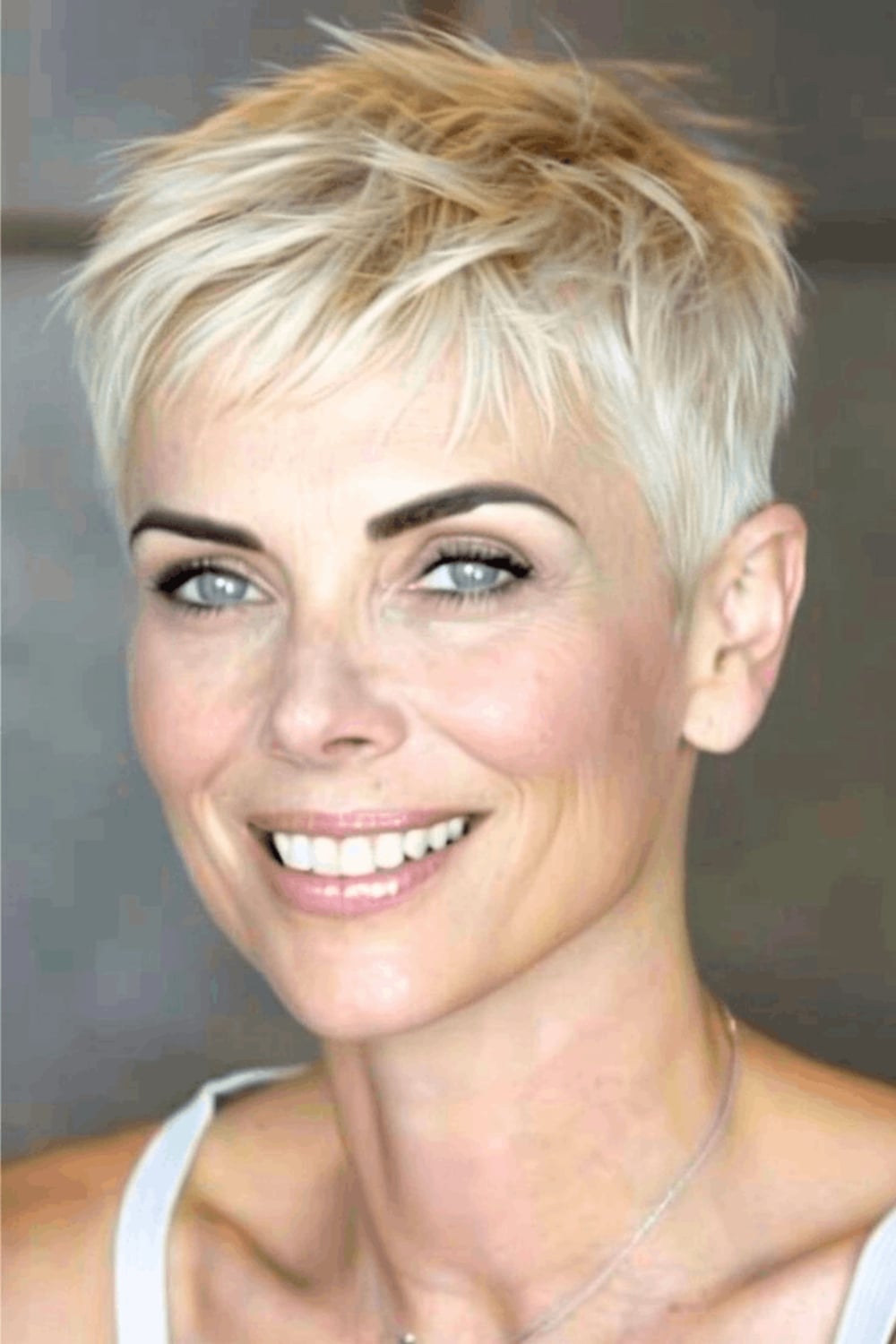 Ash Blonde Pixie With Choppy Bangs And Textured Finish — Aesthetic Thin Hair
