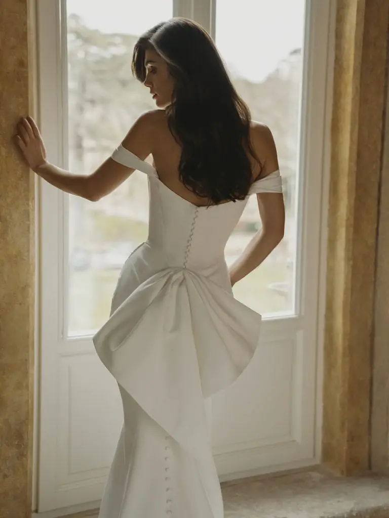 Ivory Mermaid Wedding Dress with Oversized Bow Detail Ivory Mermaid Wedding Dress with Oversized Bow Detail — Aesthetic Wedding Dress