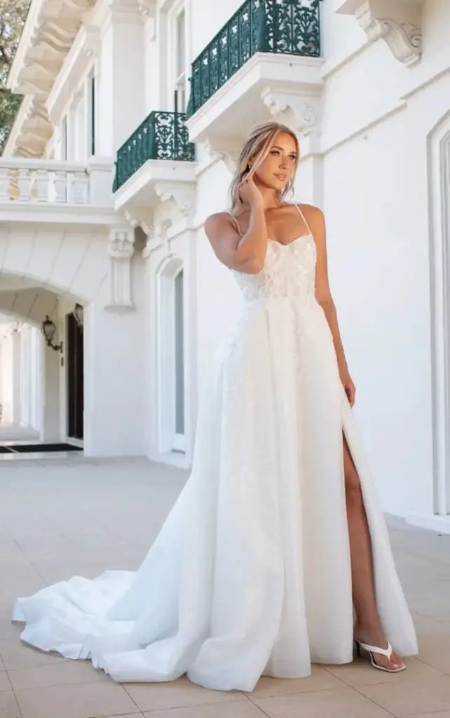 White Fitted Wedding Dress with High Slit and Sequin Embellishments White Fitted Wedding Dress with High Slit and Sequin Embellishments — Aesthetic Wedding Dress