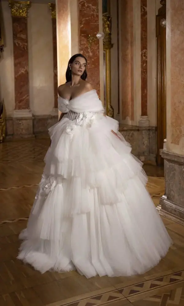 Ivory Ball Gown Wedding Dress with Tiered Skirt and Floral Appliqués Ivory Ball Gown Wedding Dress with Tiered Skirt and Floral Appliqués — Aesthetic Wedding Dress