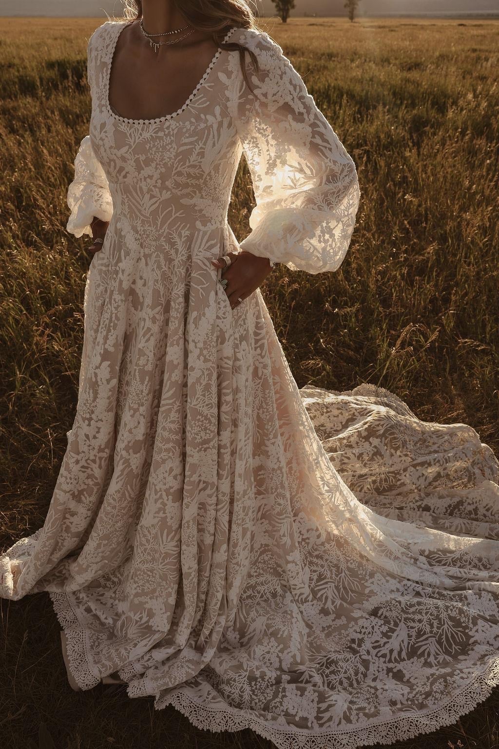 Ivory Lace Wedding Dress with Square Neckline and Puffy Long Sleeves Ivory Lace Wedding Dress with Square Neckline and Puffy Long Sleeves — Aesthetic Wedding Dress