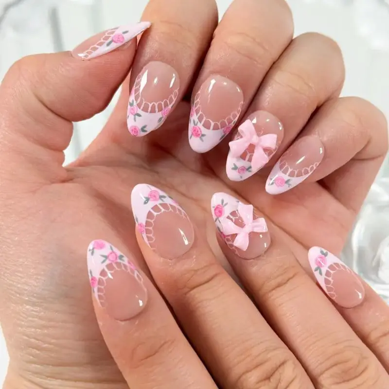 Medium Almond Nails with Lace-Like Tips and Pink Bows — Best Cute Almond Nails