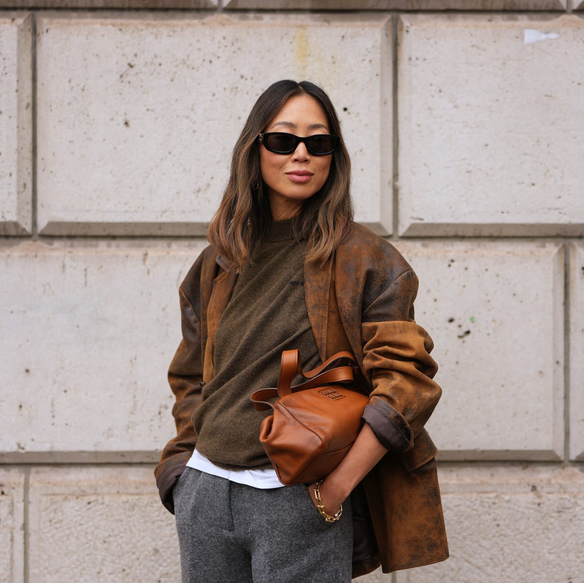 Oversized Leather Jacket Over Olive Sweater and Gray Trousers — Best Cute Outfits