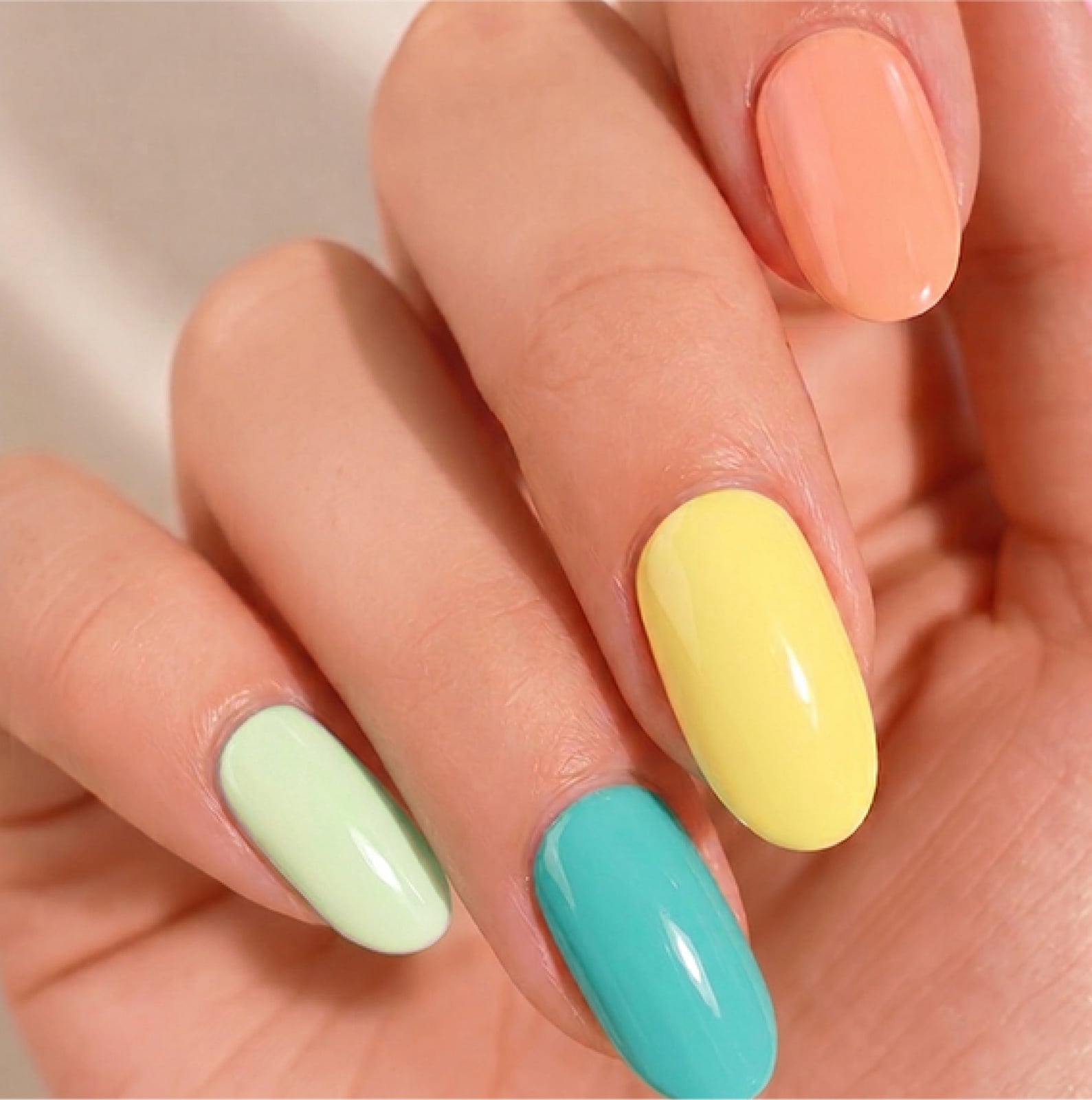 Pastel Multi-Color Short Oval Gel Nails, Close-Up Take Pastel Multi-Color Short Oval Gel Nails, Close-Up Take — Best Gel Nails