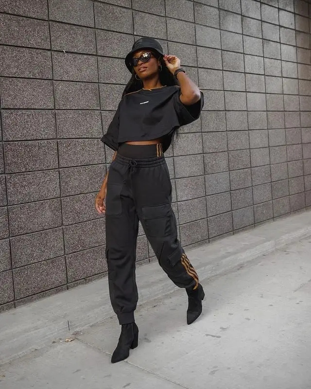 Cargo Sweatpants with Gold Stripe Detail and a Crop Top — Chic Black Sweatpants Outfit