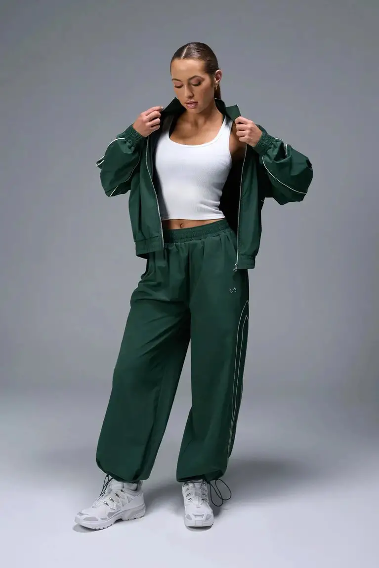 Green Tracksuit Cargo Pants with White Tank Top Green Tracksuit Cargo Pants with White Tank Top — Chic Green Cargo Pants Outfit