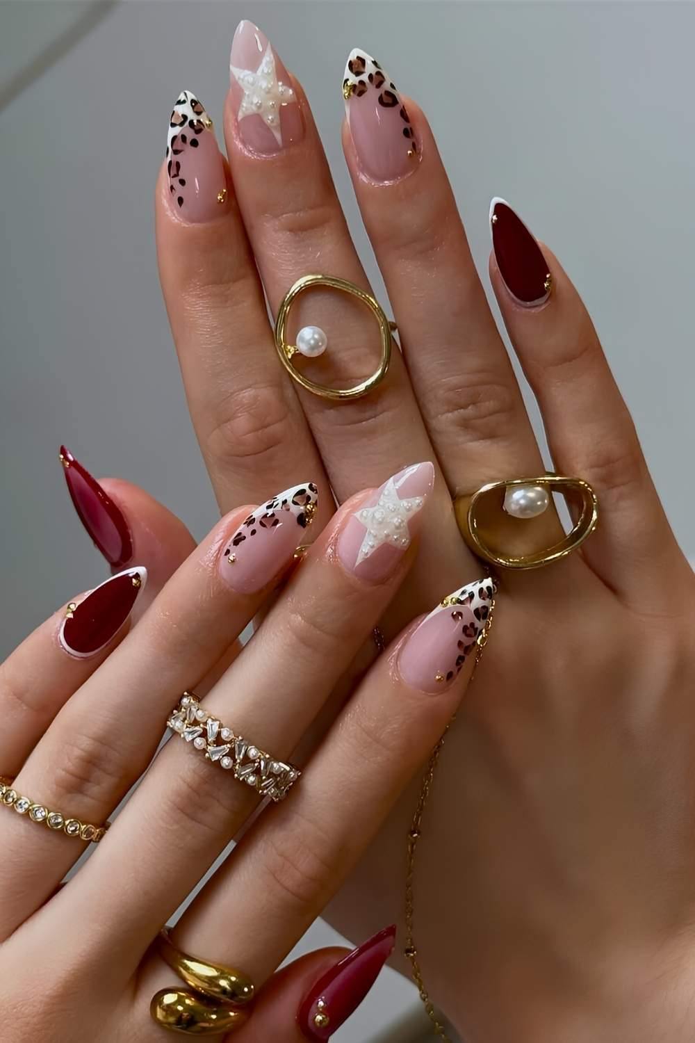 Nude Leopard Accent Burgundy French Nails, Close-Up Take Nude Leopard Accent Burgundy French Nails, Close-Up Take — Classy Animal Print Nails
