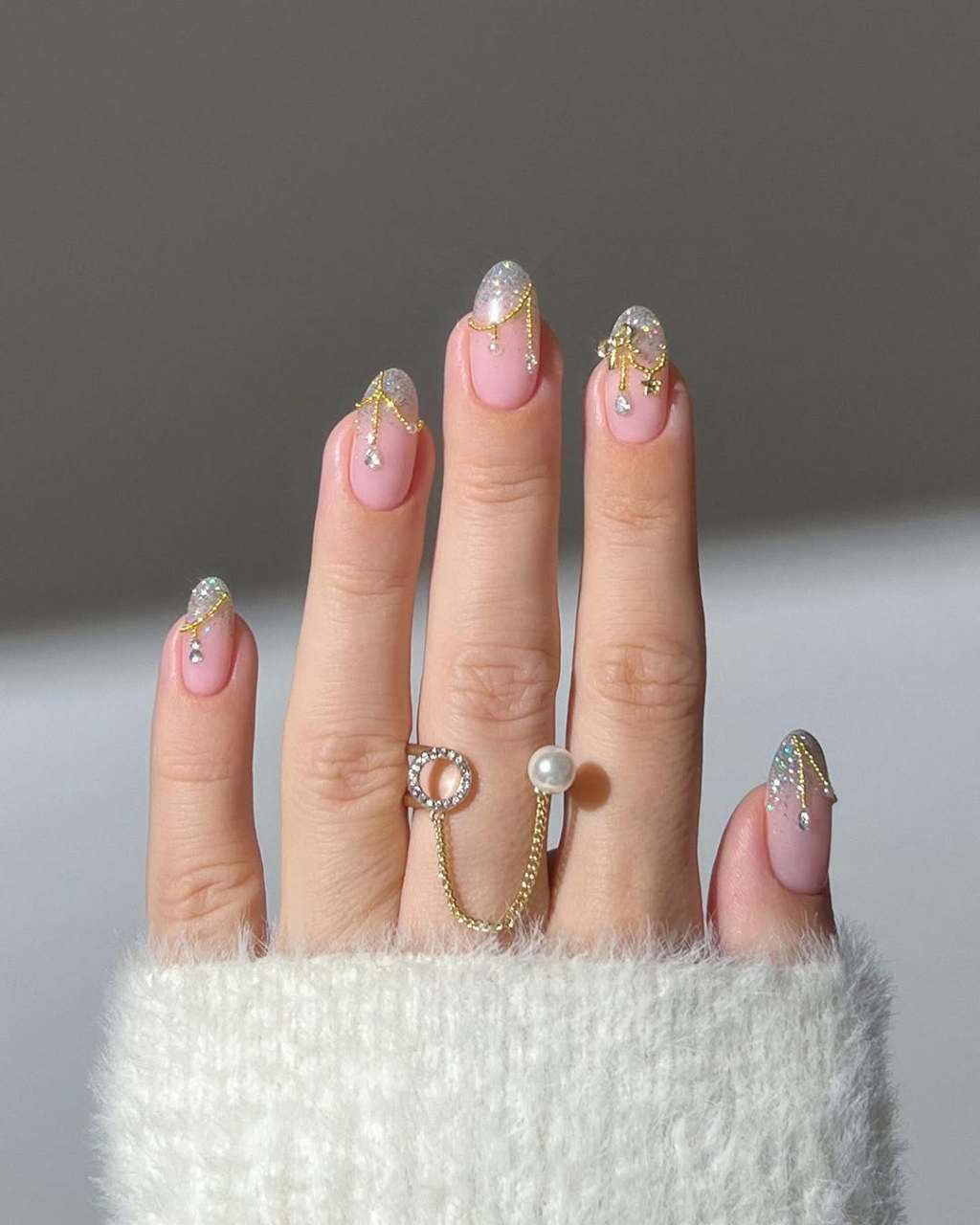 Almond Glitter Tips With Gold Charms Almond Glitter Tips With Gold Charms — Classy Anniversary Nails
