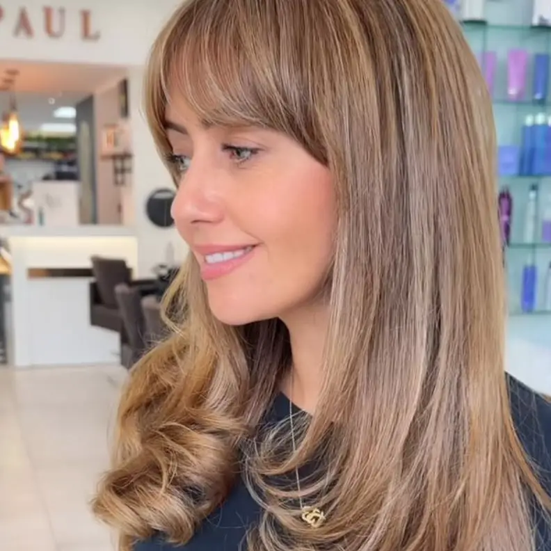 Shoulder Length Light Brown With Subtle Blonde and Curtain Bangs Shoulder Length Light Brown With Subtle Blonde and Curtain Bangs — Classy Balayage Hair