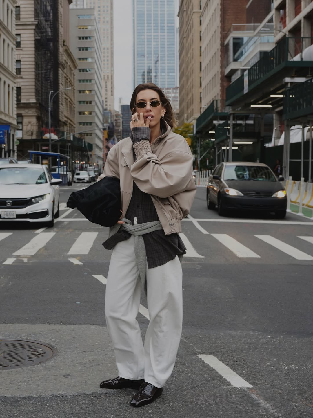 Black Patent Loafers with White Trousers and Bomber Jacket — Classy Black Loafers Outfit