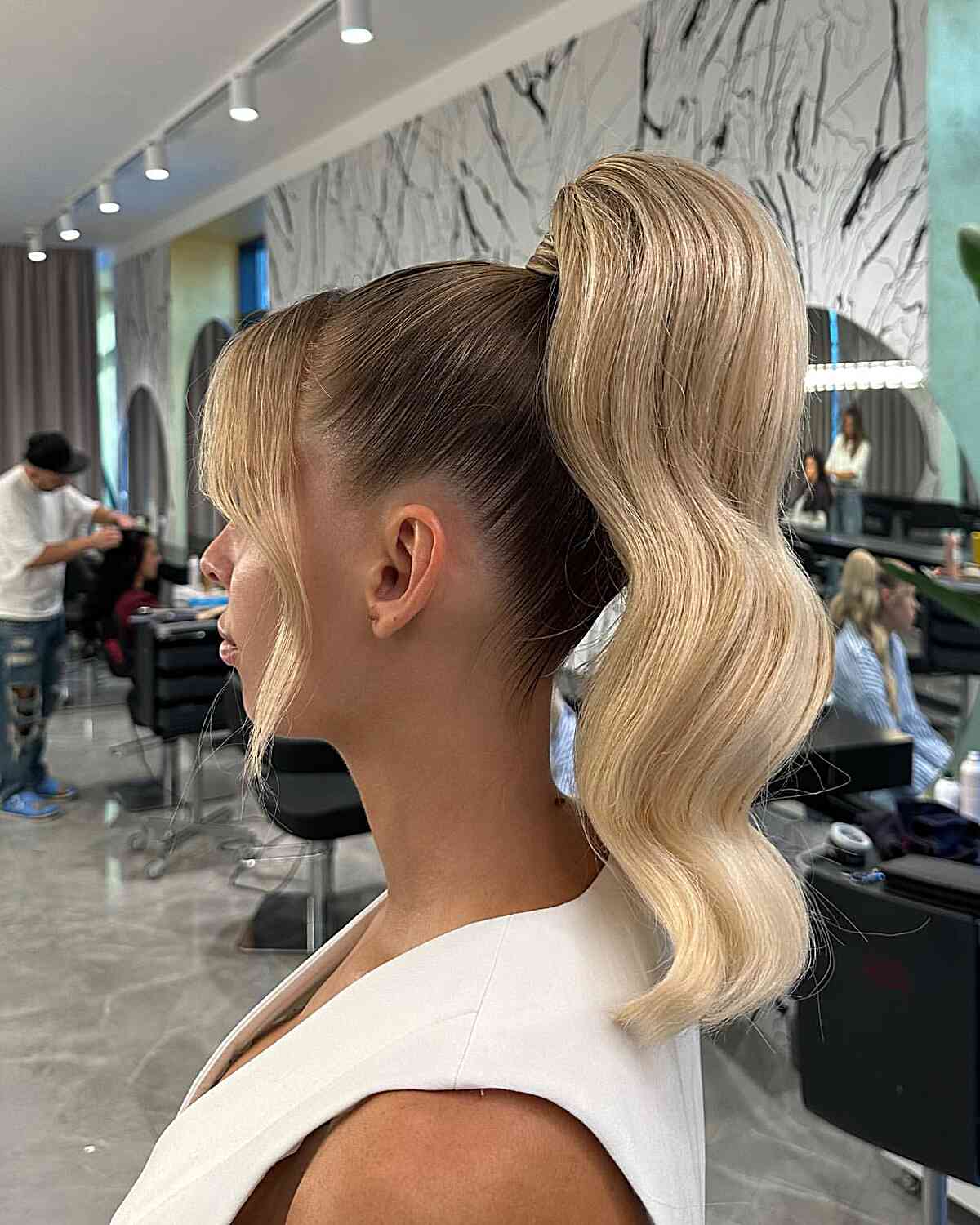 High Ponytail With Dramatic Waves and Bangs — Classy Blonde Ponytail