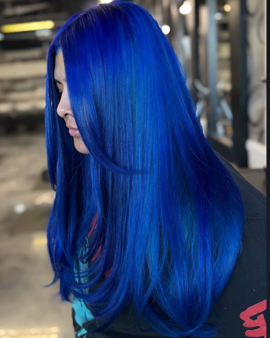 Mid-Back Vibrant Blue With Darker Undertones — Classy Blue Hair Color