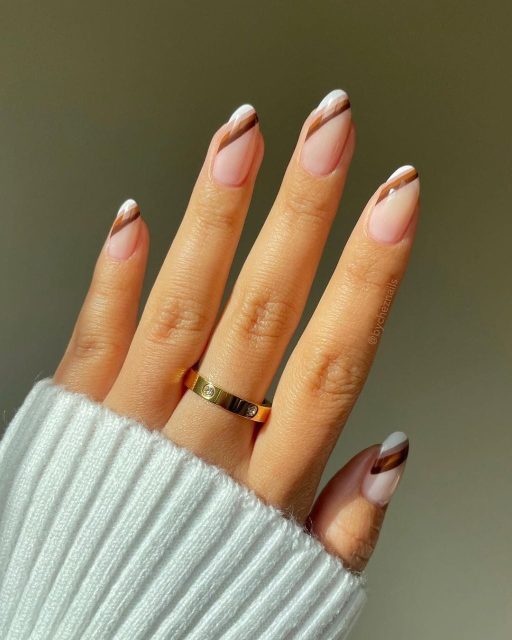 Medium Almond Sheer Nude Diagonal French With Brown Stripe Medium Almond Sheer Nude Diagonal French With Brown Stripe — Classy Boho Nails